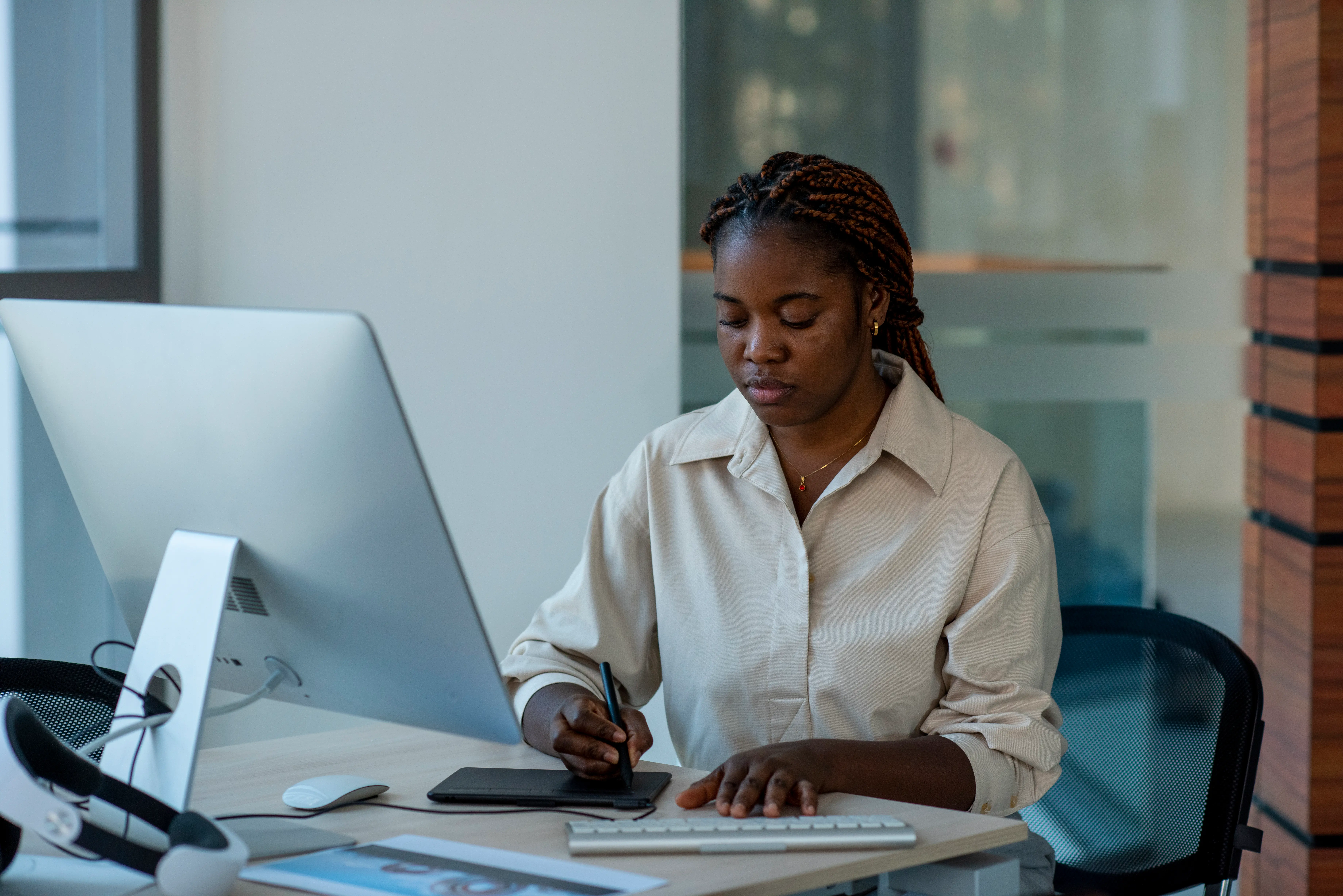 Confident woman at desk